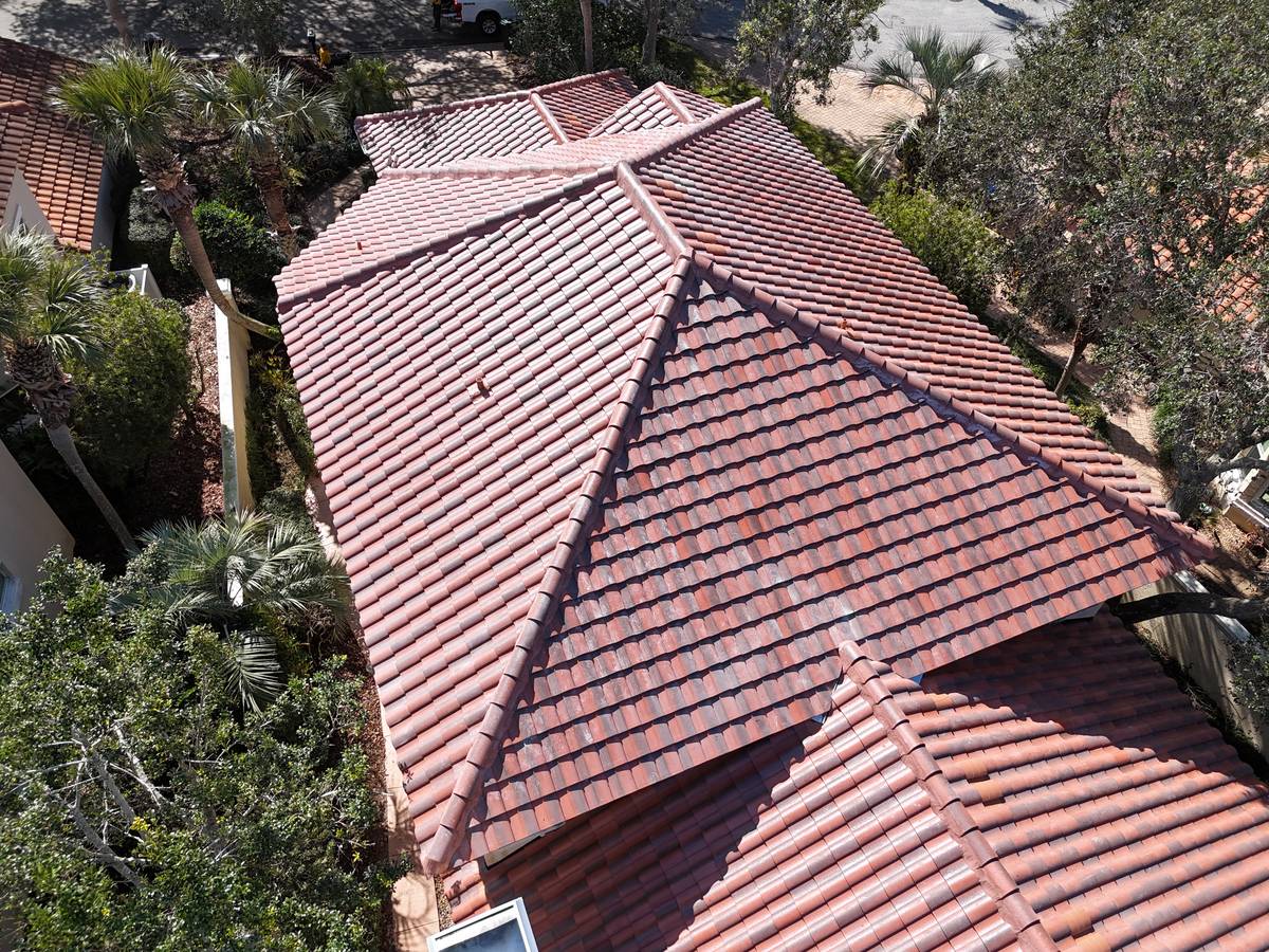 Barrel tile roof on a Palm Coast home with a complex hip and valley layout