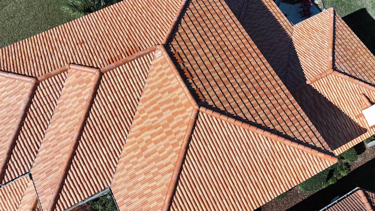 Barrel tile roof on a lakefront estate home in the La Costa community